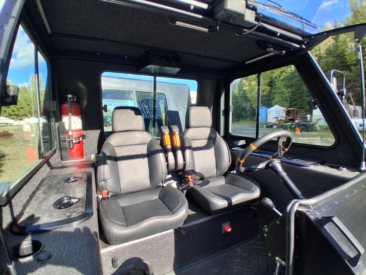 Swamp Rider cabin interior with leather seats and harnesses